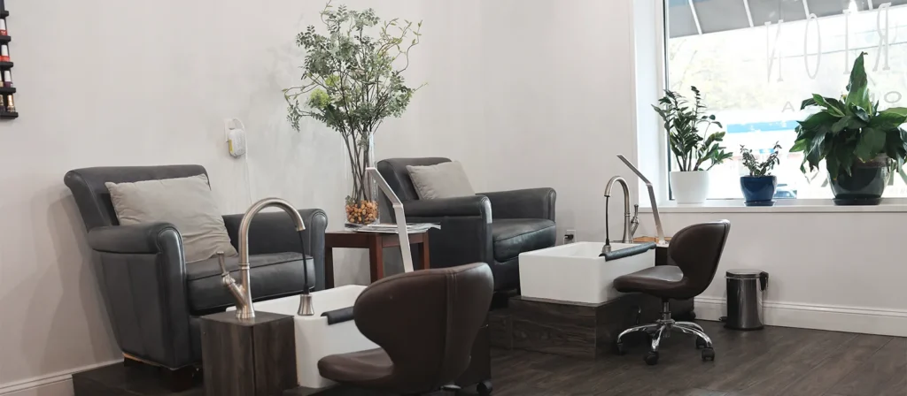 - Marion Salon Spa in Salt Point, NY Two armchairs and two footbaths are set up for pedicures in a modern, clean salon with neutral colors and several potted plants by the window. Guests can also enjoy deluxe hydrafacial skin treatments in this serene space, making it the perfect setting for relaxation and rejuvenation. - Marion Salon Spa in Salt Point, NY